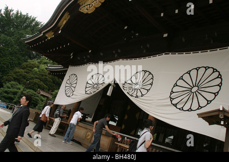 Visitors at Yasukuni Jinja (shrine), Japan's shrine to the dead of World War 2 , Kudanshita district of Tokyo, Japan Stock Photo