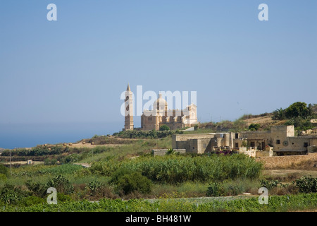 Gozo church on hill in June. Stock Photo