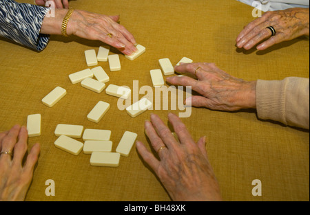 Old people playing domino Stock Photo