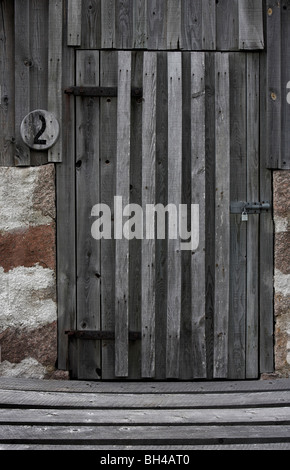 Wooden door in historic bucket mill at Finzean. Stock Photo