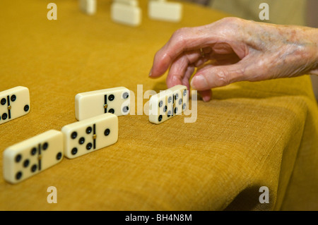 Old people playing domino Stock Photo