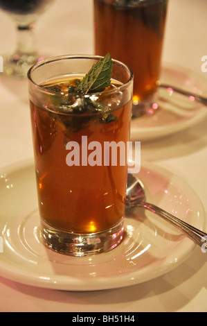Moroccan mint tea in tall glass Stock Photo
