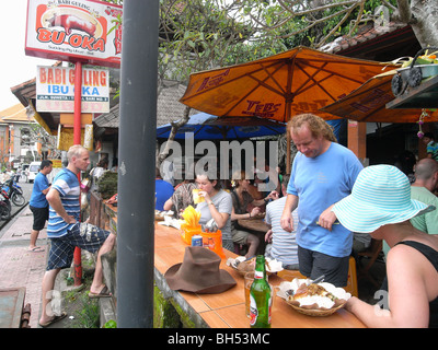 Tourists eating at Babi Guling restaurant in Ubud, Bali, Indonesia. No MR or PR Stock Photo