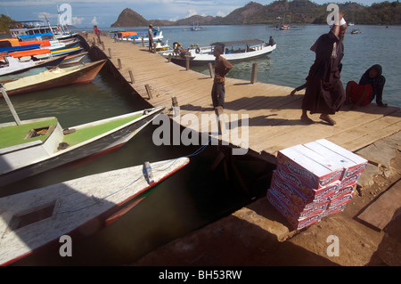 Jetty (slumping due to spectacularly rotted pilings) in harbour at Labuan Bajo, Flores, Indonesia Stock Photo