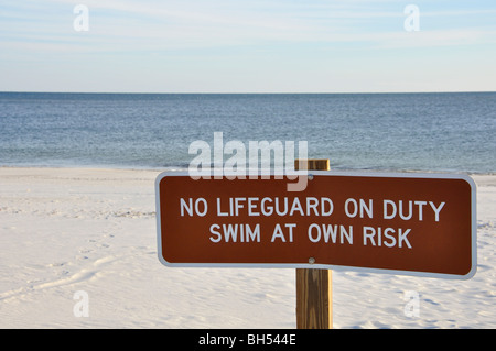 No Lifeguard on Duty sign on beach Stock Photo