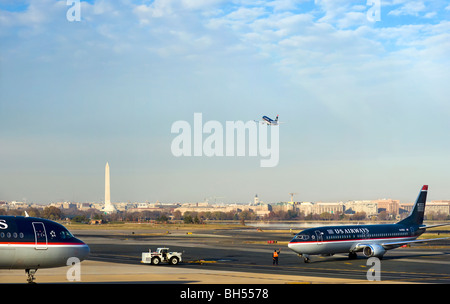 Ronald Reagan Washington National Airport tarmac Washington DC with the Potomac and Washington Monument in the background. GSE. Stock Photo