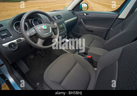 Interior with drivers seat and steering wheel, Skoda Yeti SUV 2010 model Stock Photo