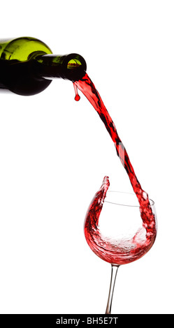 Red wine pouring down from a wine bottle Stock Photo