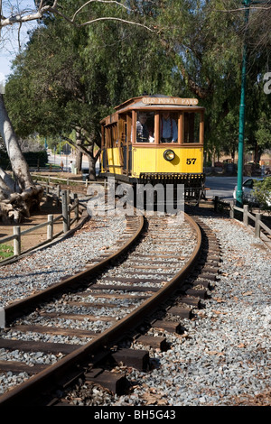 1894 Los Angeles Yellow-Line Trolley Car going around track, Poway-Midland Railroad, Old Poway Park, Poway, California Stock Photo