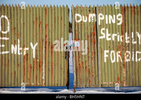 Corrugated metal fence with No Entry Sign Stock Photo