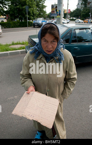 Roma gypsy begging for money at road side in Ploiesti Prahova Romania Eastern Europe Stock Photo