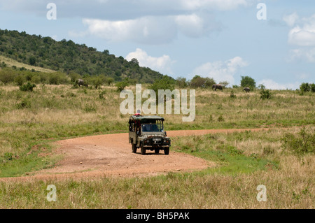 Jeep during a safari, Masai Mara National Reserve, Kenya. Stock Photo