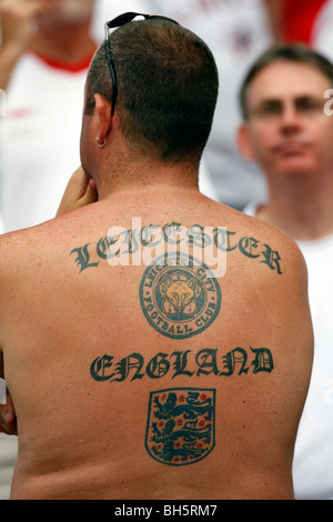 an england and leicester city football fan with tattoos on his back bh5rm7