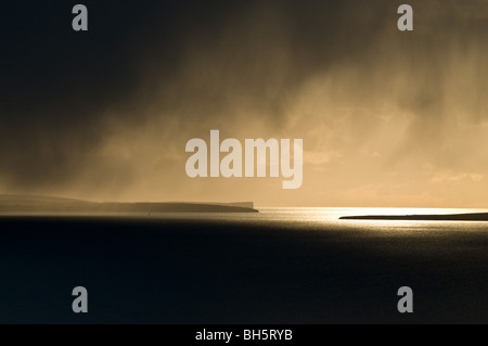 dh Hoxa Sound SCAPA FLOW ORKNEY atmospheric snow clouds sunlight hoxa head islands weather skyscape winter Stock Photo