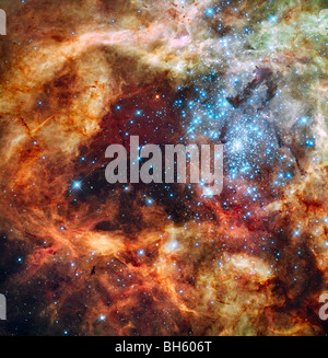 A stellar nursery known as R136 in the 30 Doradus Nebula. Stock Photo