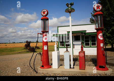 Old red petrol pumps at Big Horn County Historical Museum Hardin, Montana, USA Stock Photo