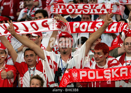 Polish football fans hold up scarfs at the 2006 Football World Cup Finals Stock Photo