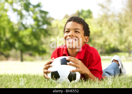 Boy In Park With Football