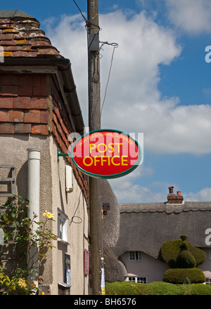 Post Office Sign outside Village Store, Winterbourne Gunner, Wiltshire, England Stock Photo