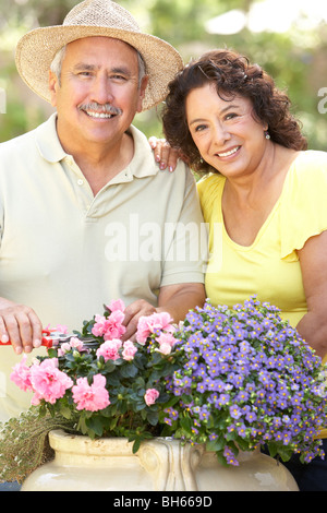 Senior Couple Gardening Together Stock Photo