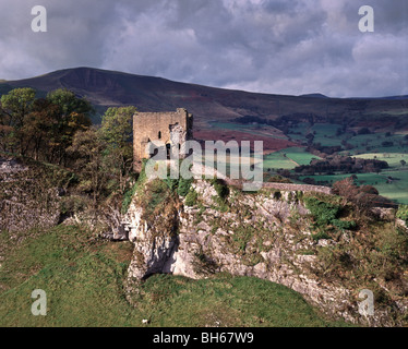 Peveril Castle on its rocky outcrop above Cave Dale at Castleton in England's Peak District National Park Stock Photo