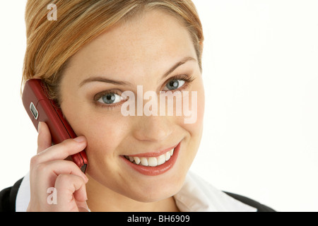 Young Businesswoman Using Mobile Phone Stock Photo