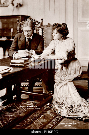Wealthy Couple Studying Documents Stock Photo