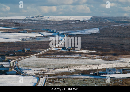 dh Kirbister ORPHIR ORKNEY Winter road snowscene countryside wintery roads scotland weather Stock Photo