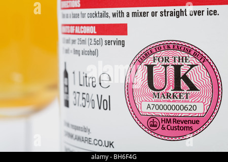 HM Revenue & Customs liable to UK excise duty label printed on a bottle ...