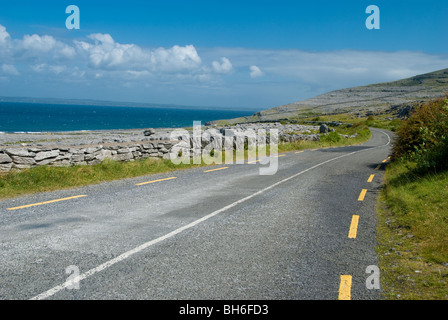 The coastal road in the Burren, looking towards Black head. Stock Photo
