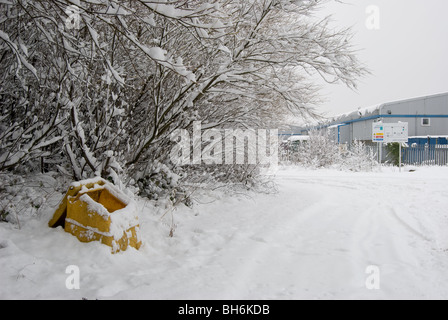 Entrance to an industrial estate covered in snow Stock Photo