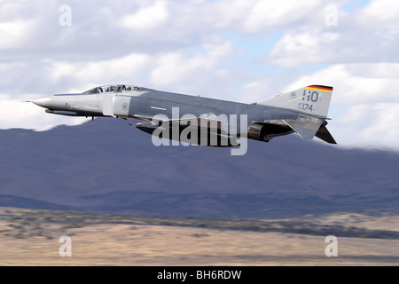 McDonnel Douglas F-4E Phantom II based at Holloman Air Force Base in New Mexico takes to the air. Stock Photo