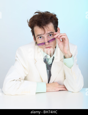 Funny disheveled a serious young man in glasses Stock Photo