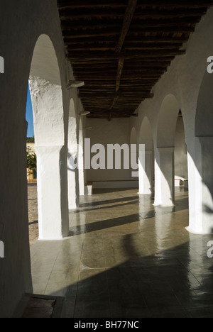 Detail view of arcade and courtyard of the Sant Carles de Peralta church, Ibiza, Spain Stock Photo
