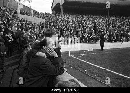 The crowd of fans at The Den that helped Millwall FC play 59 home games 1964-67 in a row without losses. Stock Photo
