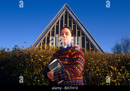 Feminist theologian, writer and Anglican priest Jan Fortune-Wood outside her St Barnabas Church in Kingshurst. Stock Photo