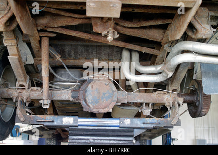 Underside of pickup truck on lift Stock Photo - Alamy