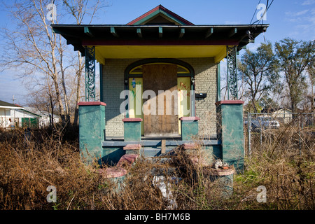 A home damaged by Hurricane Katrina, lower ninth ward, New Orleans, Louisiana. This style of house is called shotgun. Stock Photo