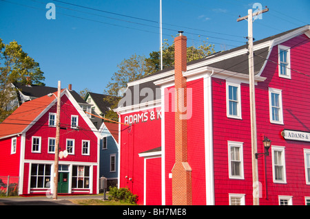 Nova Scotia, Lunenburg, Colorful red painted buildings lining the streets of Lunenburg. World Heritage UNESCO Site Stock Photo