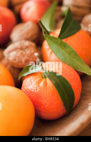 fruits and nuts on table Stock Photo