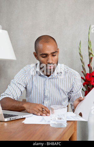 A businessman looking at documents Stock Photo