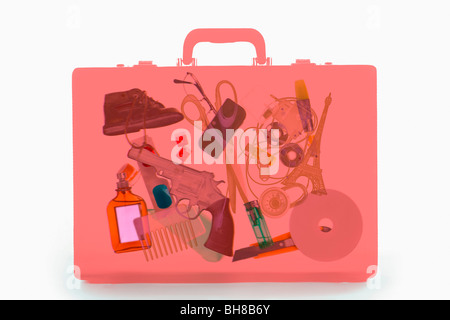 X-ray image of a briefcase containing illicit objects Stock Photo