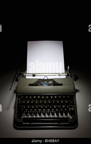 An old-fashioned typewriter with paper An old-fashioned typewriter with paper