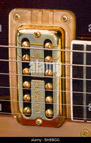 pickup on an electric guitar in gold (Gretsch) Stock Photo