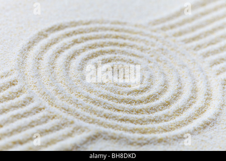 Abstract composition of fine white sand with circles Stock Photo