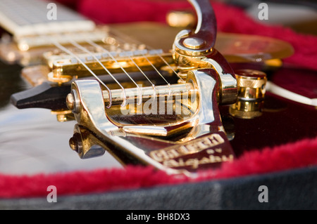 How the strings are attached on an electric guitar (Gretsch) detail with limited depth of focus Stock Photo