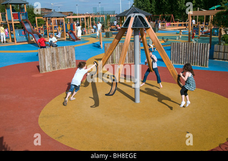 Children in a playground in Hampstead Heath, London Stock Photo