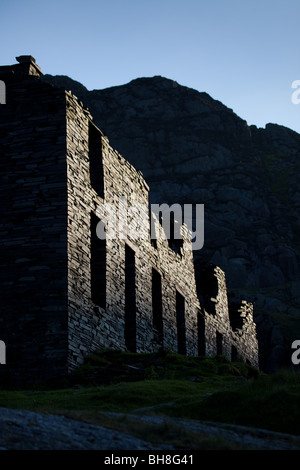 The ruins of a terrace of houses, near the lake, in the slate mining valley Cwmorthin Stock Photo