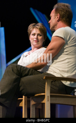 Welsh opera singer Rebecca Evans and rock star Sting in discussion at Hay Festival 2009. Stock Photo