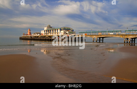 View of the sandy beach and Victorian Pier at Bournemouth in Dorset in south west England UK Stock Photo